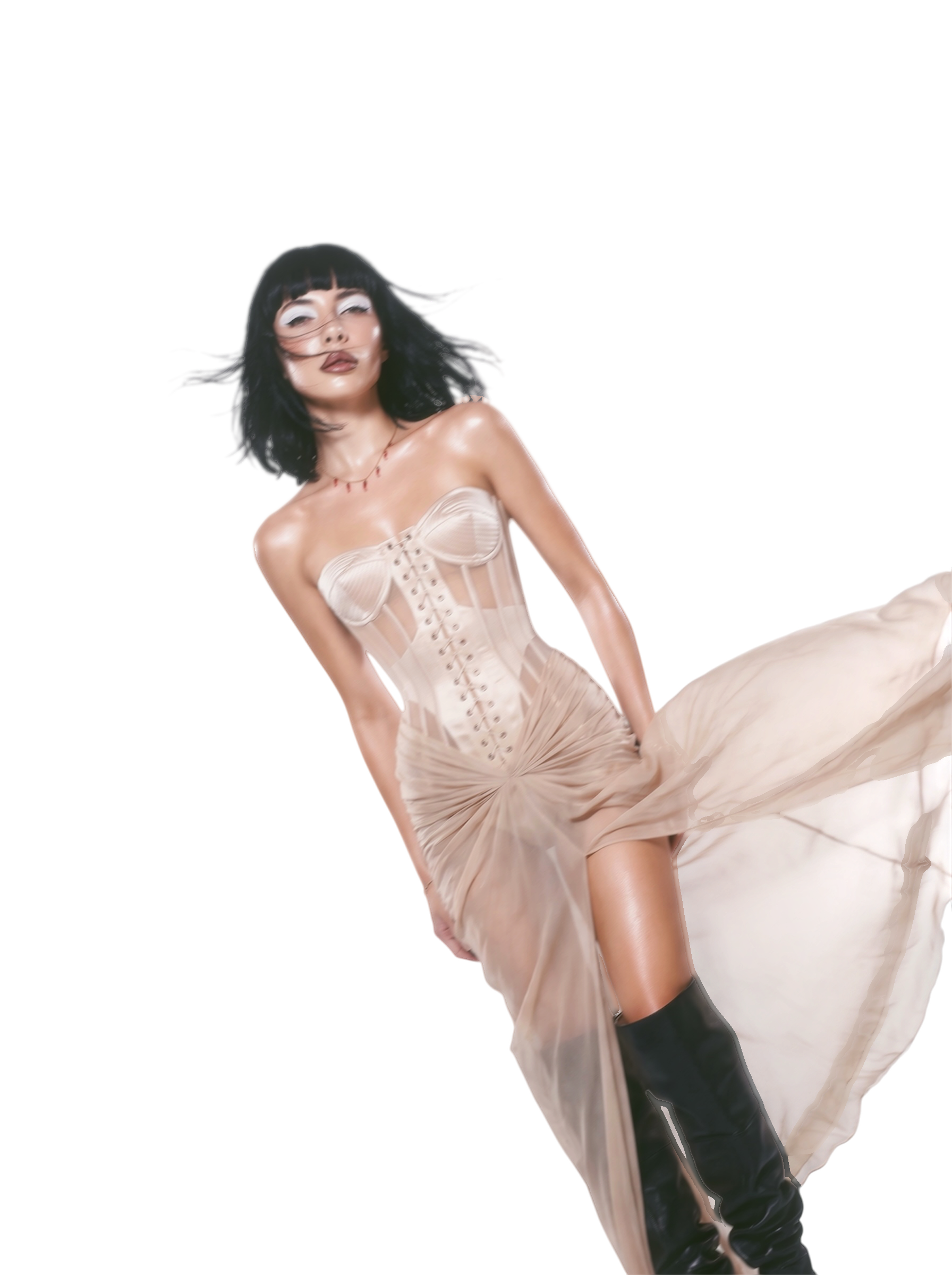 Helen Kotenko in a nude corset gown and black boots, hair and skirt blown by wind